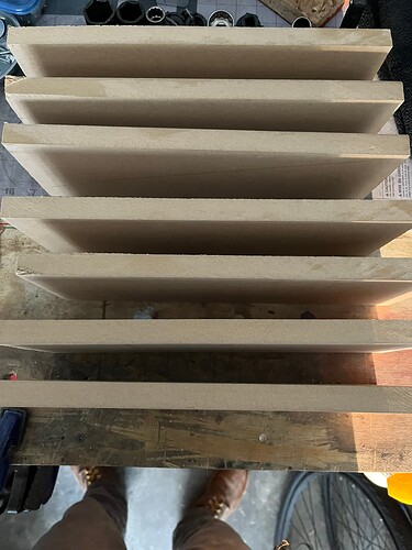 cut planks lined up for gluing