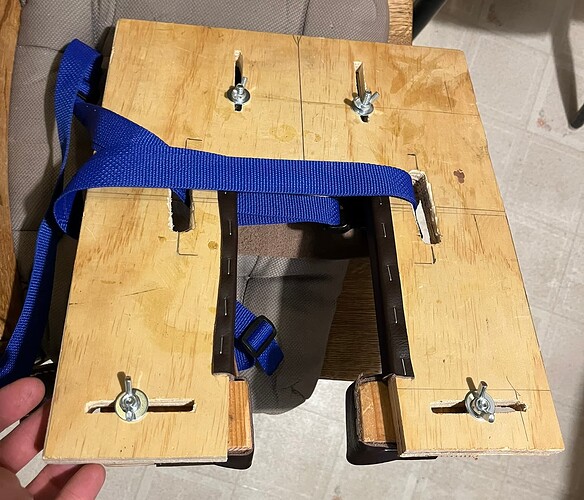 bottom view of slots, bolts, and wingnuts