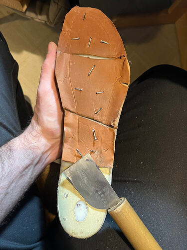 End of Round 1. I've just cut flaps all around. From the ball back, the depth was three quarters. I set some tacks closer to the feather edge around the toe, so I marked the line at half an inch there.